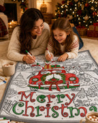 Une maman et sa fille colorient le plaid de Noël motif Voiture de Noël sur le tapis du salon